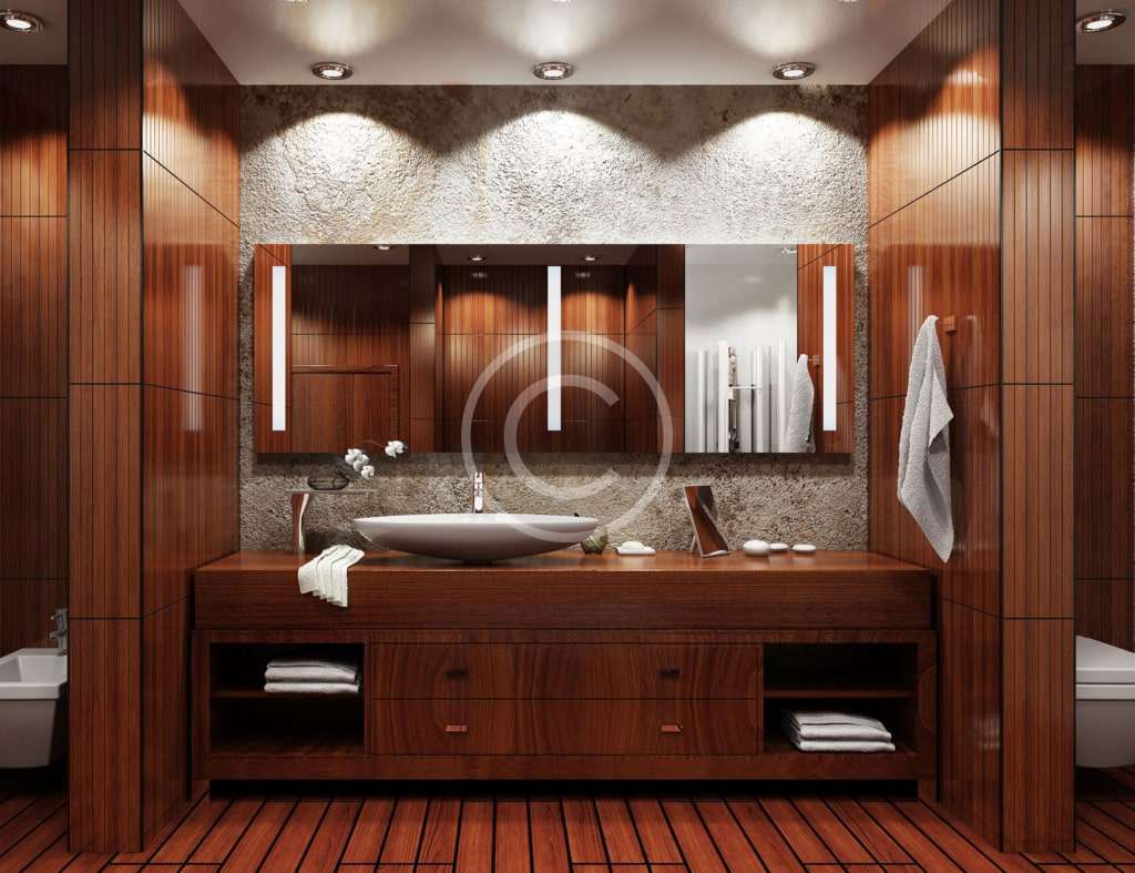 A bathroom with wood cabinets and a sink.