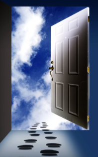 A door open to the sky with a cloud background